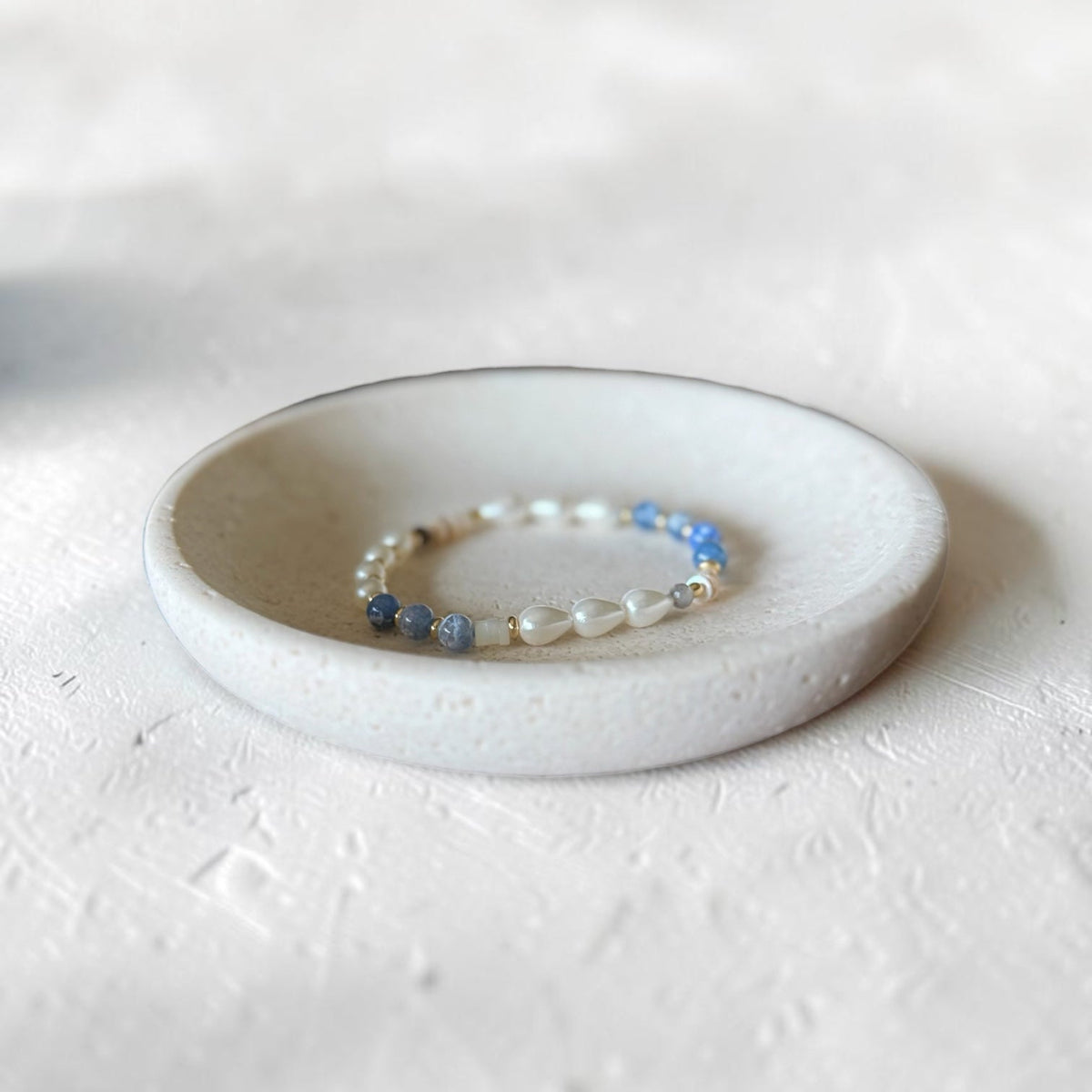 The Jodi Bracelet — Blue Fire Agate, Moonstone, and pearl stretch bracelet by Poppies & Jules