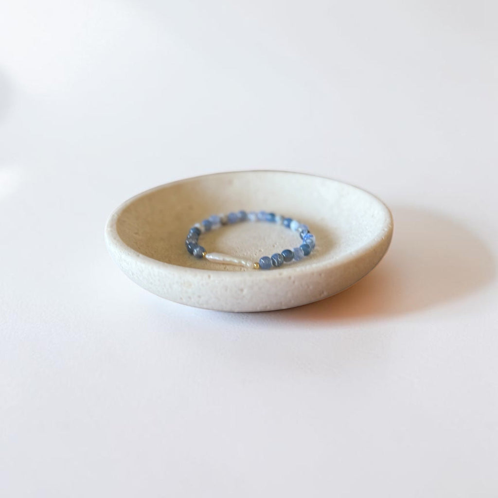 Blue Fire Agate, freshwater baroque pearl, and gold filled stretch bracelet by Poppies & Jules
