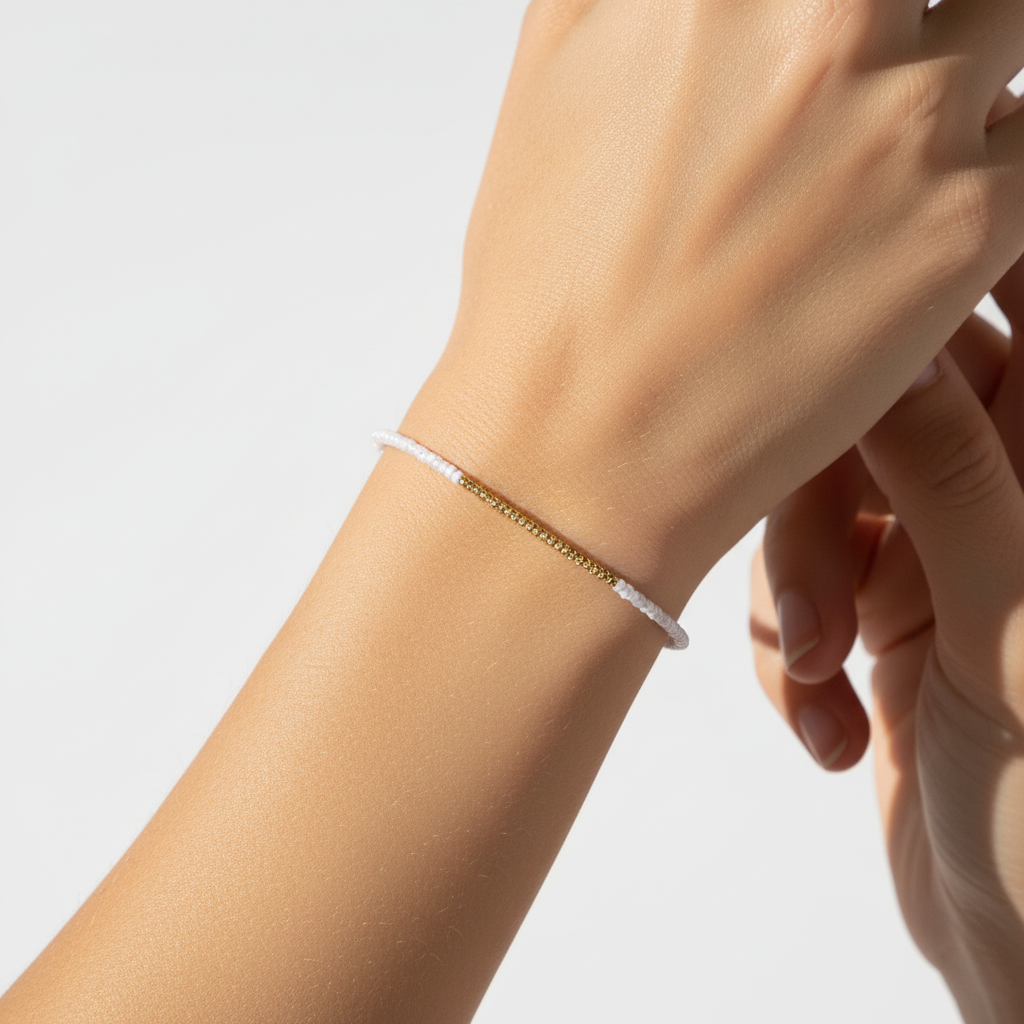 The Maren Bracelet – On Wrist. This is a close up of an arm of a female. You see a wire bracelet on the wirst. 